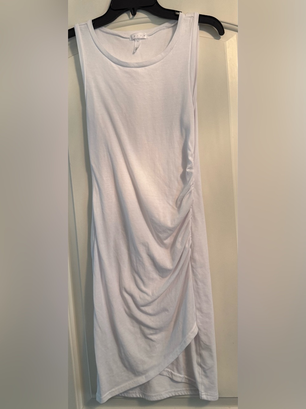 This is a Leith white sleeveless ruched tank dress.
